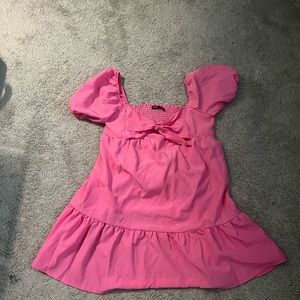 She in dress. Too big for me. Never worn